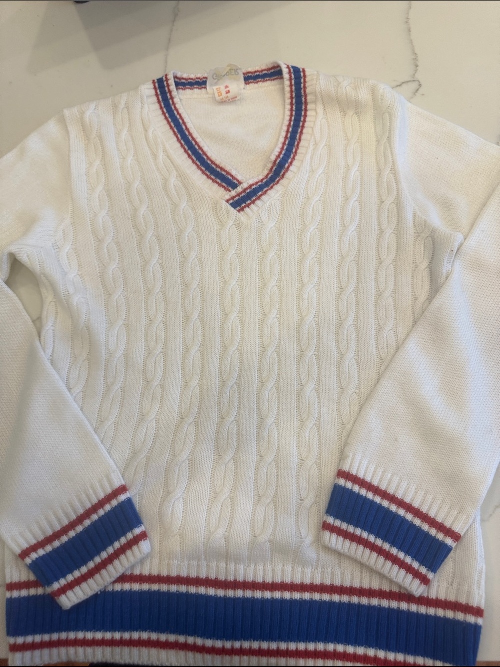 Eaton white Cable-Knit V-Neck Sweater with Blue and Red Stripe Trim